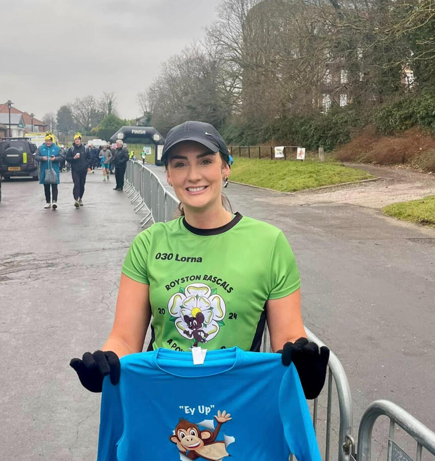 Woman holding club shirt